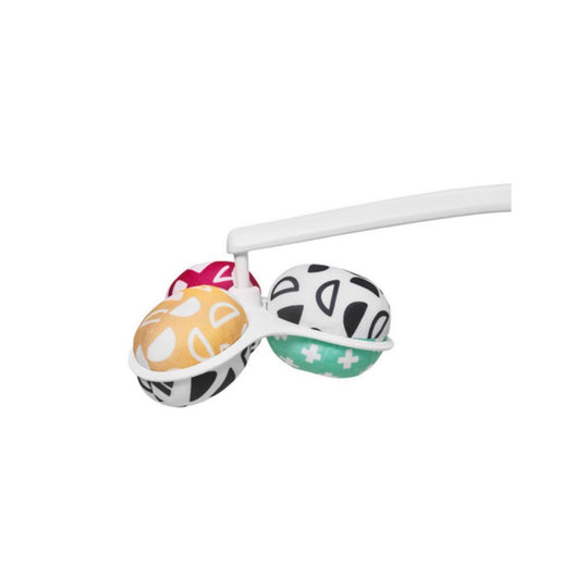 Colorful baby rattle with floral patterns on a white background