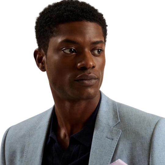 Man in Light Blue Linen Blend Cotton Blazer with with Navy Shirt