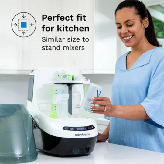 A women operating Baby Brezza Bottle Washer Pro