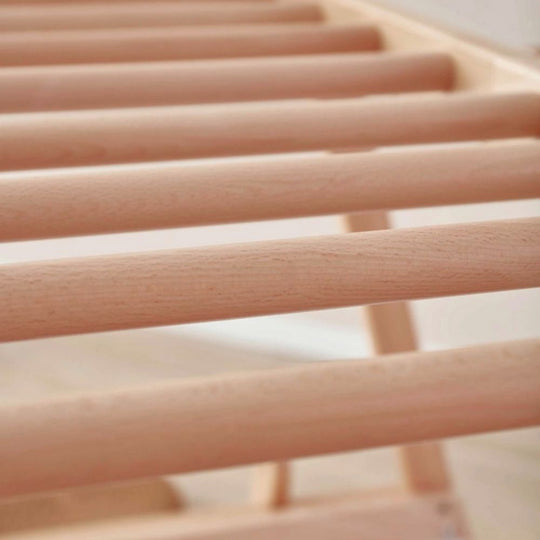 Close-up of wooden slats on a bed frame