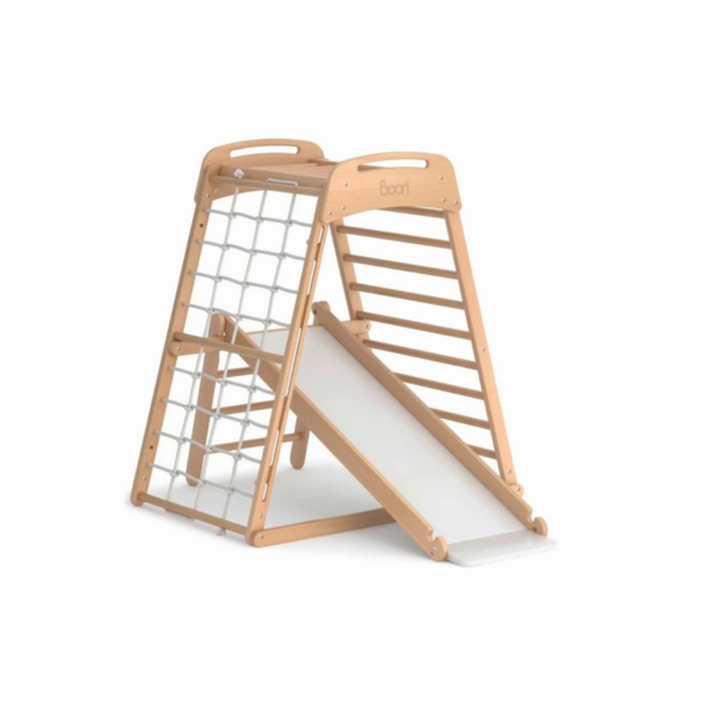 Wooden children's play structure with slide on a white background