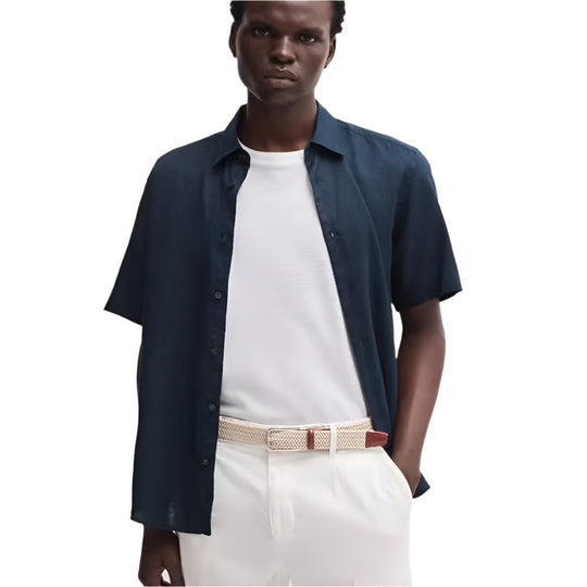 A model wearing BOSS Men's Italian-Made Woven Belt with Leather Trim and Silver Buckle