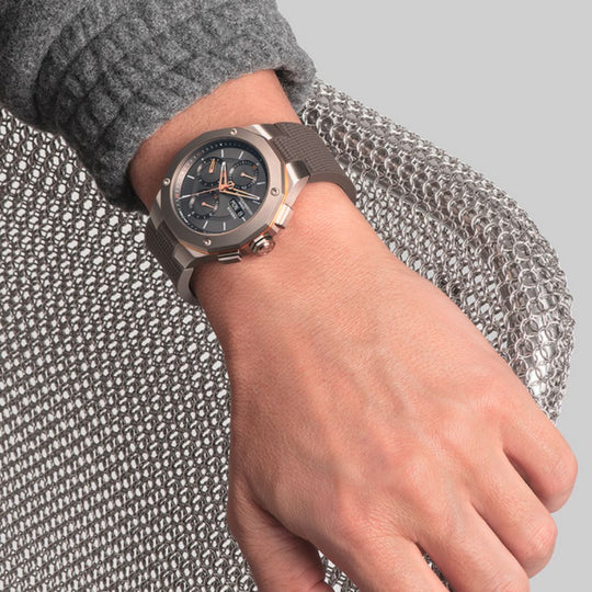 Close up image of a model's wrist with Baume & Mercier Riviera M0A10722 Men's Automatic Chronograph Watch on it