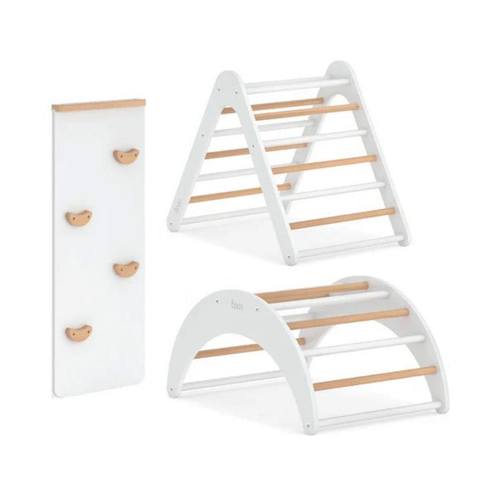 Set of white and wooden baby play gym components on a white background