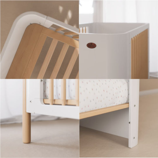 Boori Nova Cot Bed - Modern Two-Tone Toddler Convertible with wooden sides and white mattress in a minimalistic room.