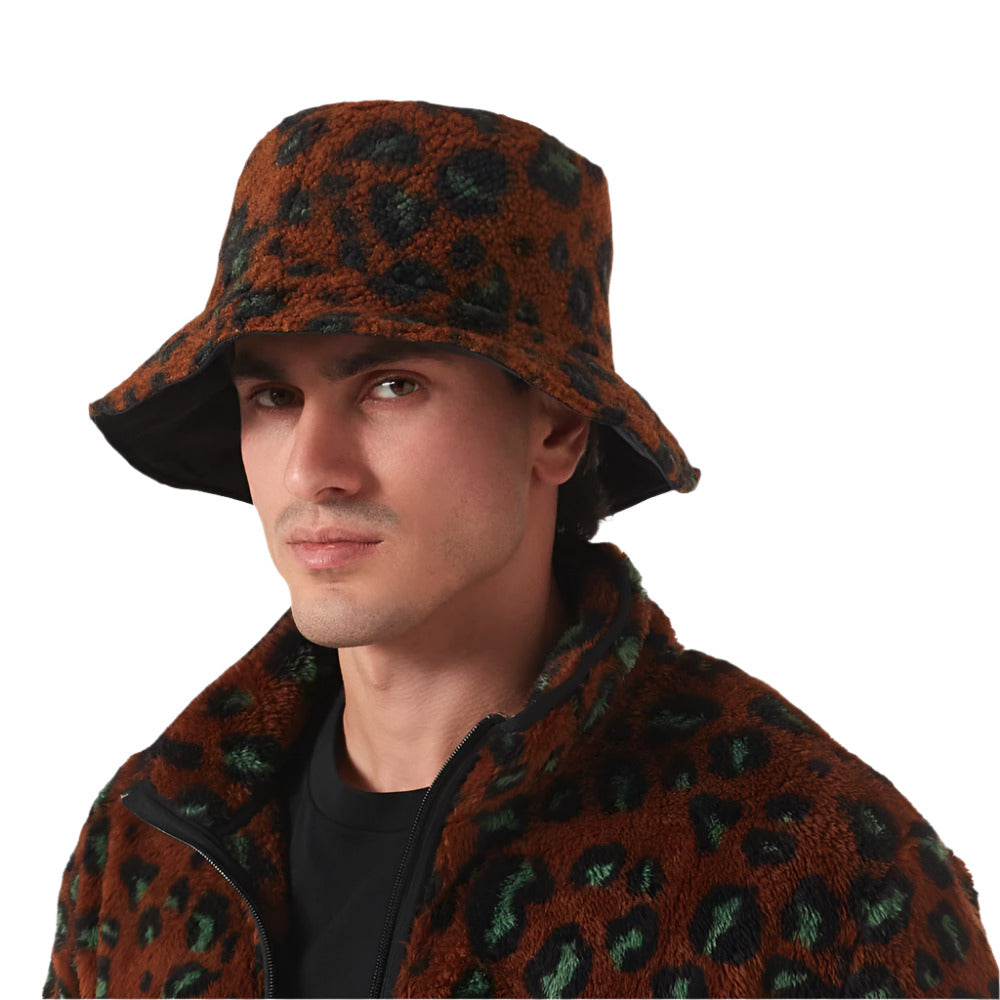A model wearing Carhartt WIP Men's Orla Leo Camo Reversible Brown Bucket Hat