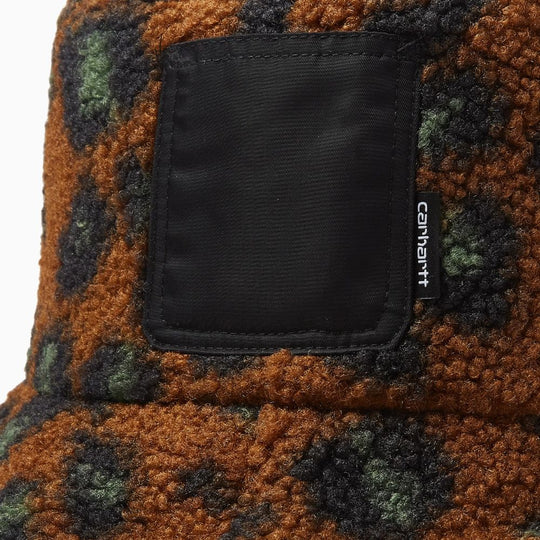 Close-up of the Carhartt WIP Orla bucket hat showing the textured fabric and logo patch.
