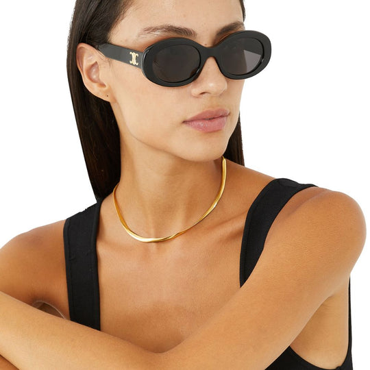 Model Wearing Celine Women's Triomphe Black Oval Sunglasses