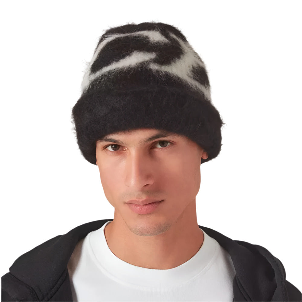 A model wearing Cole Buxton Luxurious Hand-Brushed Alpaca Black Beanie with CB Logo