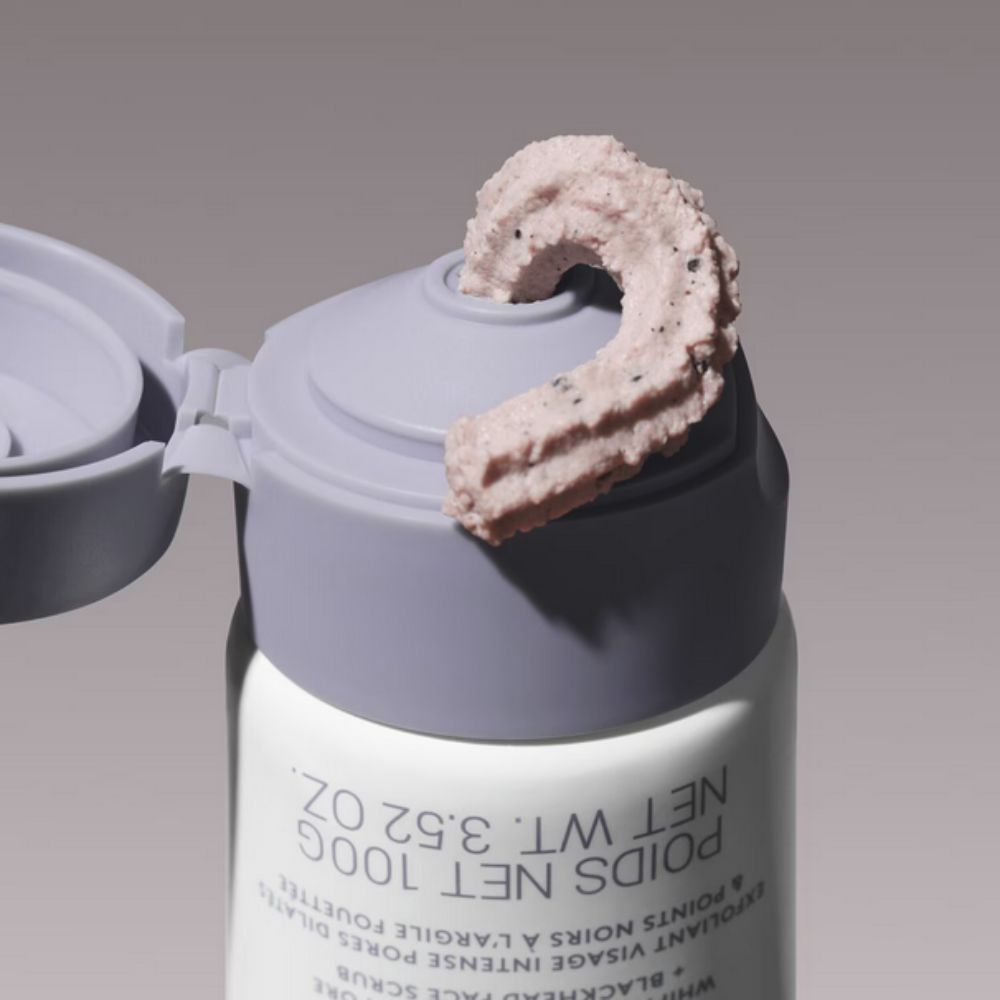 A tube of FENTY SKIN Cookies N Clean Intensive Pore + Blackhead Scrub with the light pink, speckled product squeezed out.