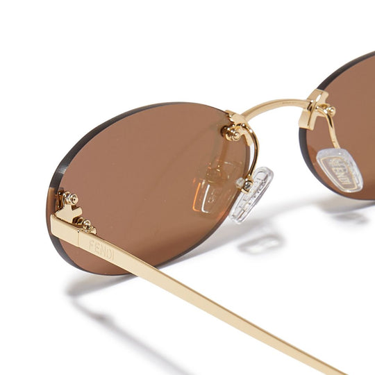 Fendi First Women's Gold Oval Sunglasses with Crystal Detailing