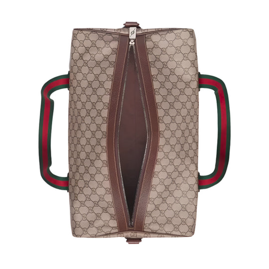 Overhead view of an open GUCCI Beige Medium Duffle Bag with Web, showing its GG Supreme canvas, brown leather trim, green and red Web handles, and brown interior lining.