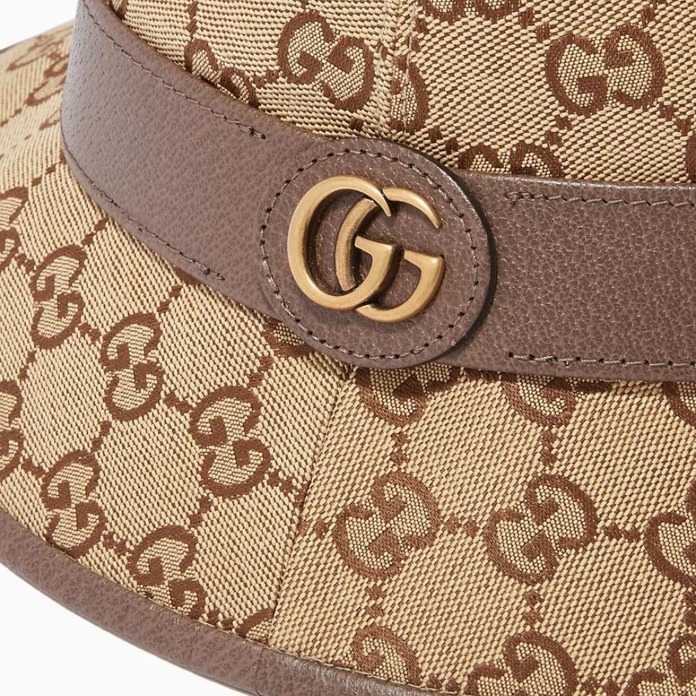 Close-up of a Gucci Beige GG Canvas Fedora Hat with Leather Trim