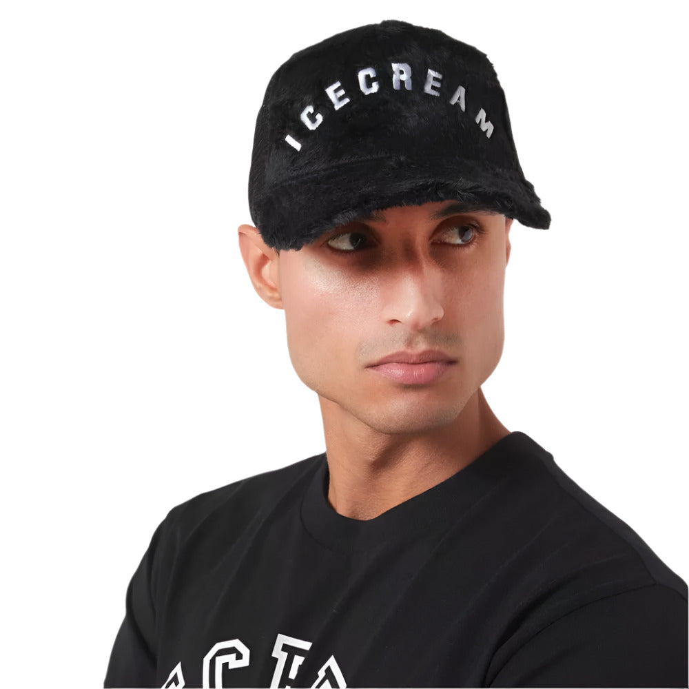 A model wearing Ice Cream Black Faux Fur Trucker Cap
