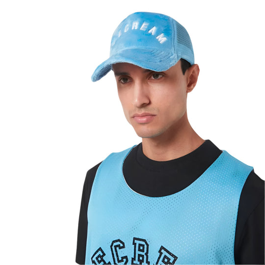 A model wearing Ice Cream Blue Faux Fur Trucker Cap