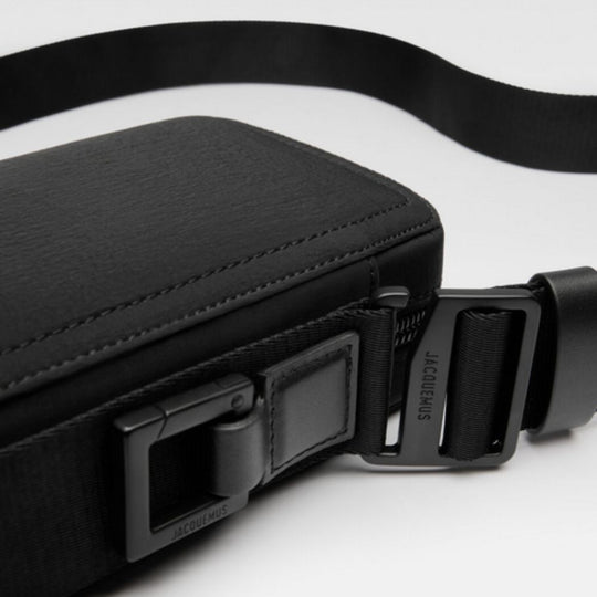 Close up of the strap on Jacquemus The Vertical Cuerda Denim Black Cross-Body Bag