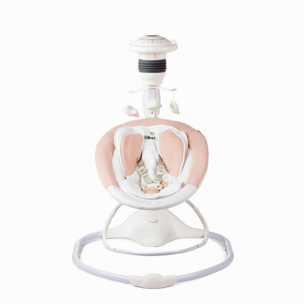 Baby swing with pink cushion and white base on a white background