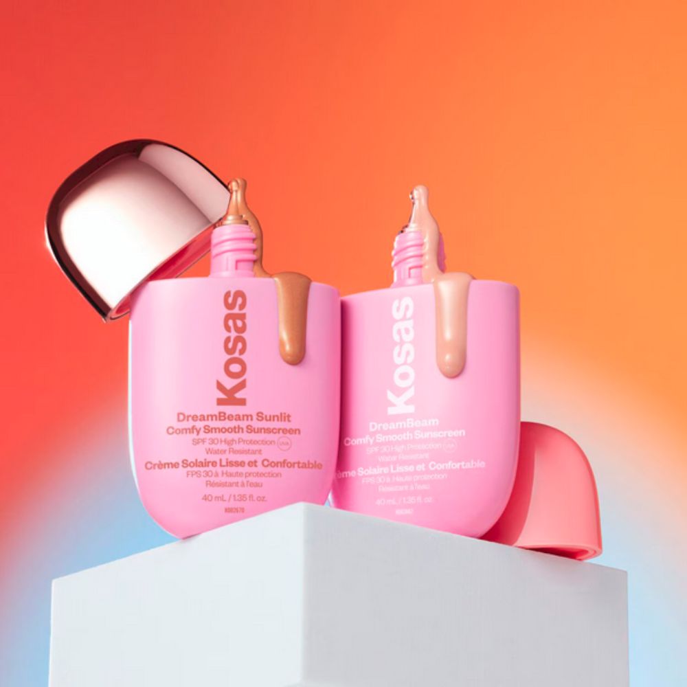 The original and Sunlit versions of Kosas DreamBeam Smoothing Makeup Base SPF30 kept besides each other
