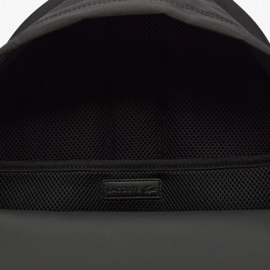 Close up of opening of LACOSTE Neocroc Black Backpack