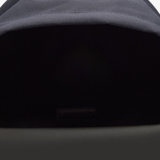 Close up of opening of LACOSTE Neocroc Blue Backpack