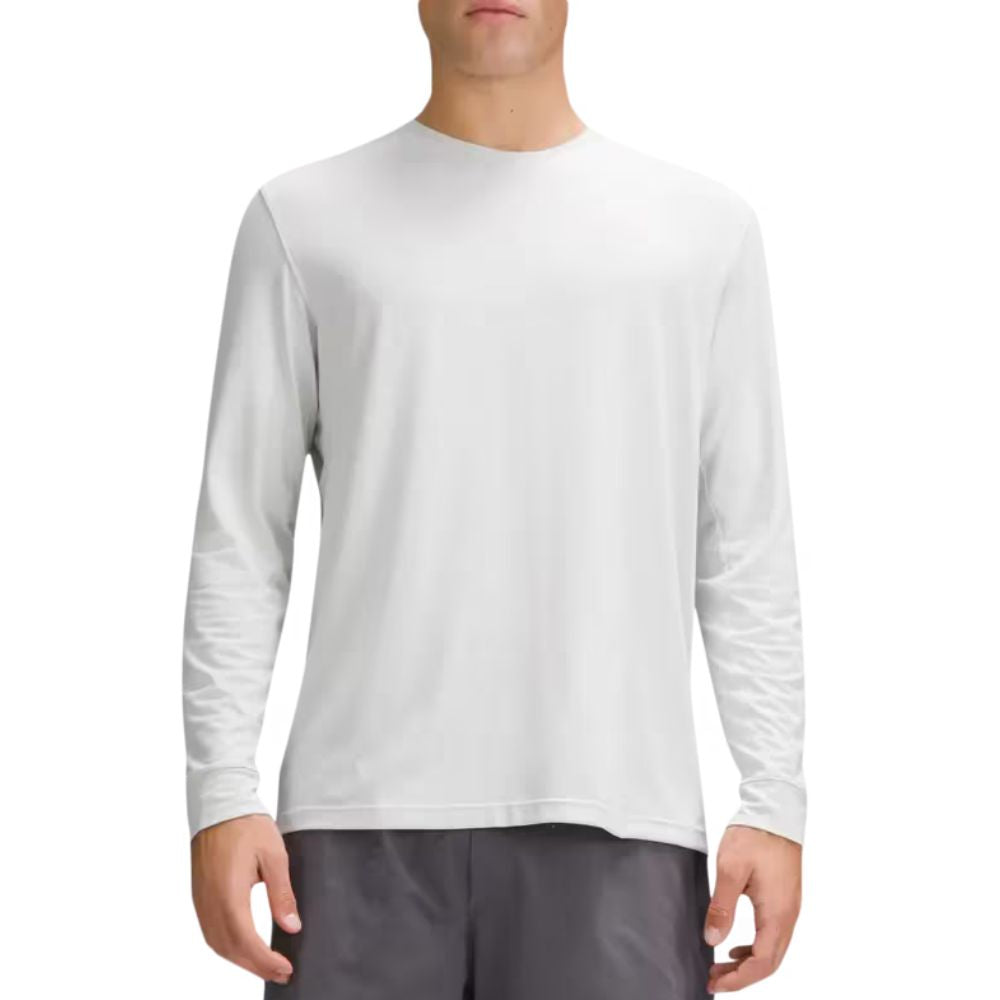 A male model wearing LULULEMON License To Train Relaxed Long Sleeve T-Shirt