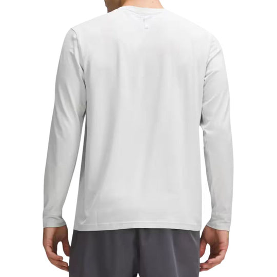 Rear view of male model wearing LULULEMON License To Train Relaxed Long Sleeve T-Shirt