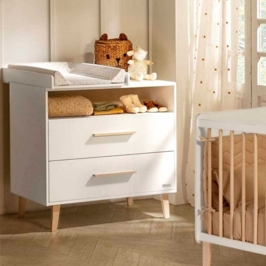 Nursery room with Micuna Trevi Dresser CO-1959 - White & Natural Wax, Antimicrobial, Soft-Closing Drawers, Crib and toys.