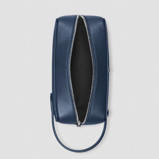 Top view of Montblanc Sartorial Travel Wash Bag in Ink Blue Full-Grain Leather whose zip is open