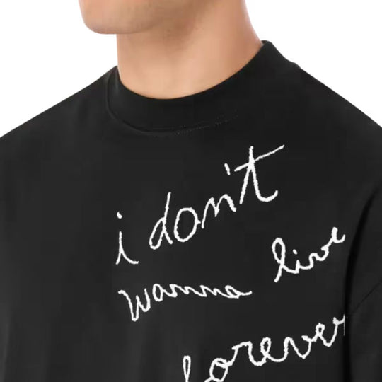 Close up view of neckline of MSGM Tiago Alexandre X MSGM I Don't Wanna Live Forever Men's T-Shirt worn by a male model