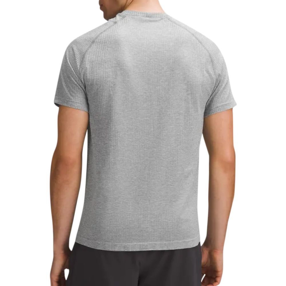Rear view of a male model wearing Metal Vent Tech Short Sleeve T-Shirt