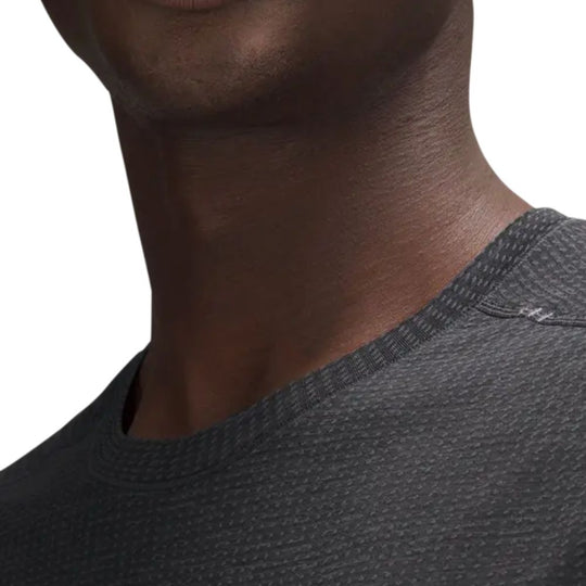 Close up view of neckline of LULULEMON Metal Vent Tech Sleeveless Vest worn by a male model