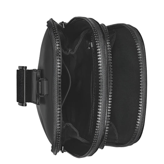 Montblanc Extreme 3.0 Compact Sling Bag - Eco-Friendly Black Leather, viewed from an overhead angle, is unzipped to reveal its multiple compartments and pockets. The interior is dark.