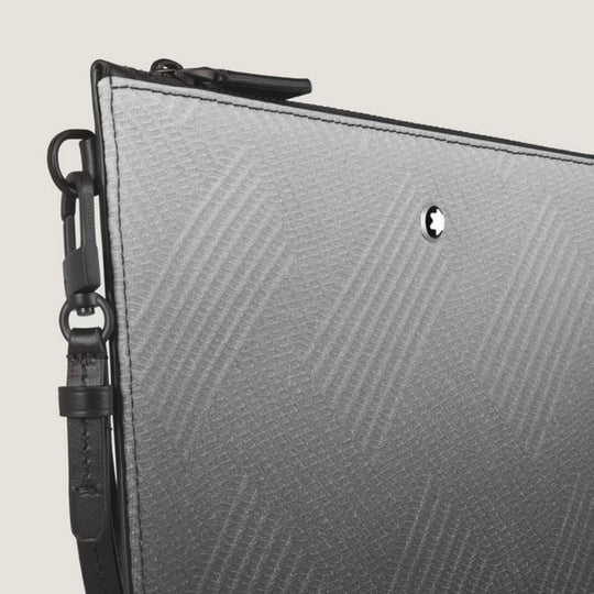 Close-up of  Montblanc Extreme 3.0 Lightweight Stylish Cross-Body Pouch with a black strap on a light beige background