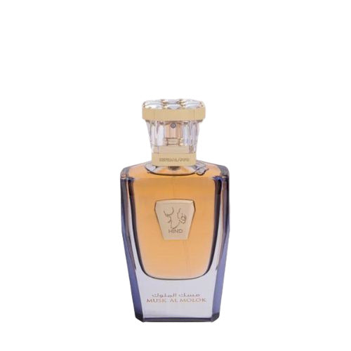 A bottle of Musk Al Molok Parfum with a clear liquid visible inside, featuring a gold-colored cap and a label with the brand name and product title.