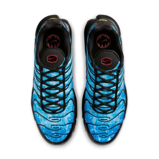 A top-down view of the Nike Air Max Plus "Shark Attack" sneakers, featuring a bold blue and black design with red accents.