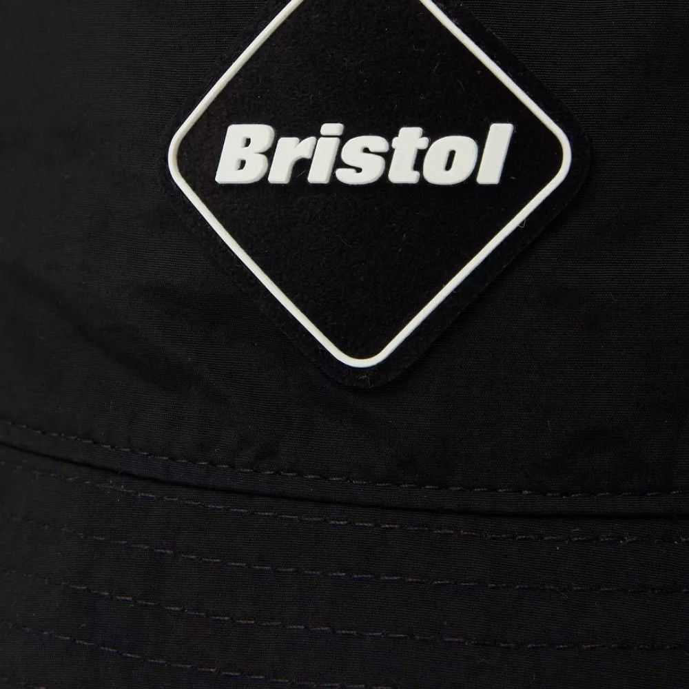 Close up of Paperboy Paris x FCRB Black Bucket Hat