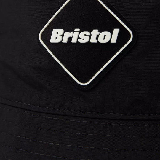 Close up of Paperboy Paris x FCRB Black Bucket Hat