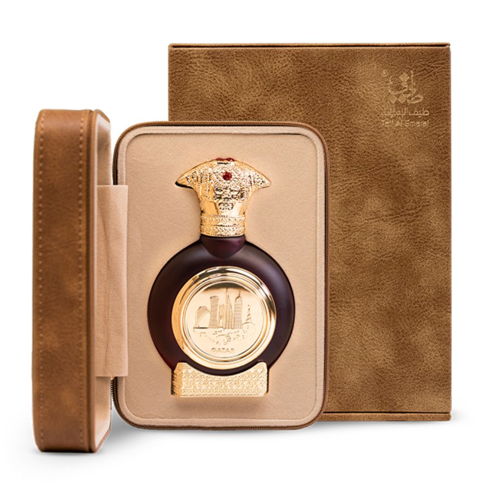 An EDP 75mL bottle of Qatar perfume by Taif Al Emarat along with its Leather Box