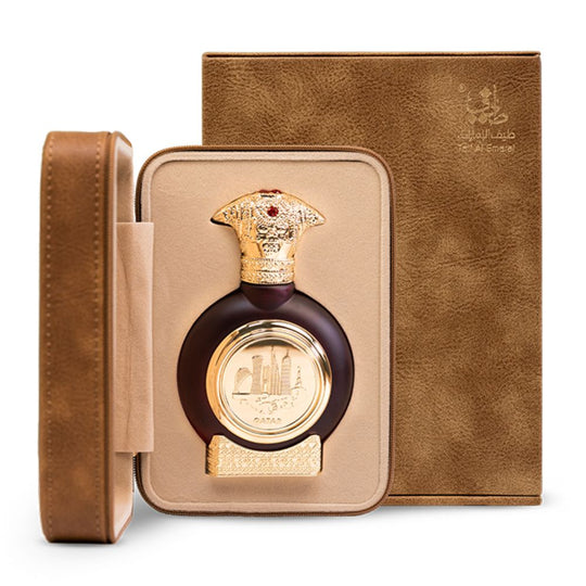 An EDP 75mL bottle of Qatar perfume by Taif Al Emarat along with its Leather Box