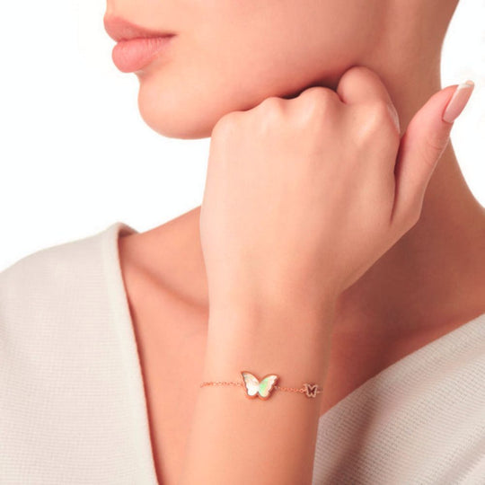 A model wearing Samra Classic Butterfly Rose Gold Mother of Pearl Single Bracelet