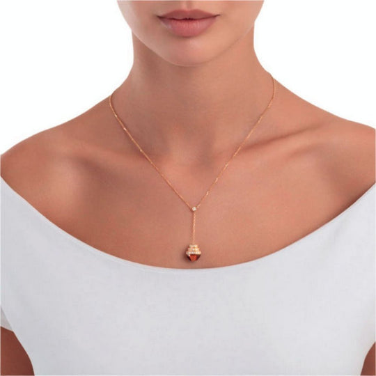 Neckline of model wearing Samra Azm Yellow Gold Tiger Eye Necklace