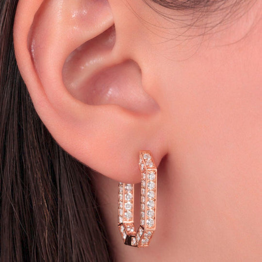 Close up of Samra Birwaz Turath Rose Gold Diamond Hoop Earrings on a model's ear