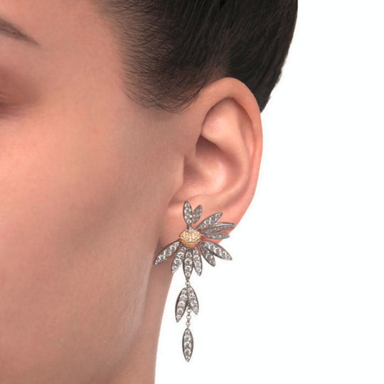 Close up of Samra Love Me Love Me Not Earring on a model's ear