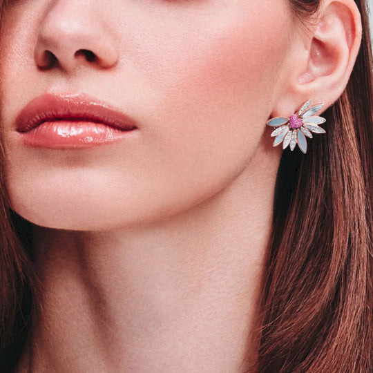 Close up of Samra Love Me Love Me Not Rose Gold Pink Sapphire Earring on a model's ear