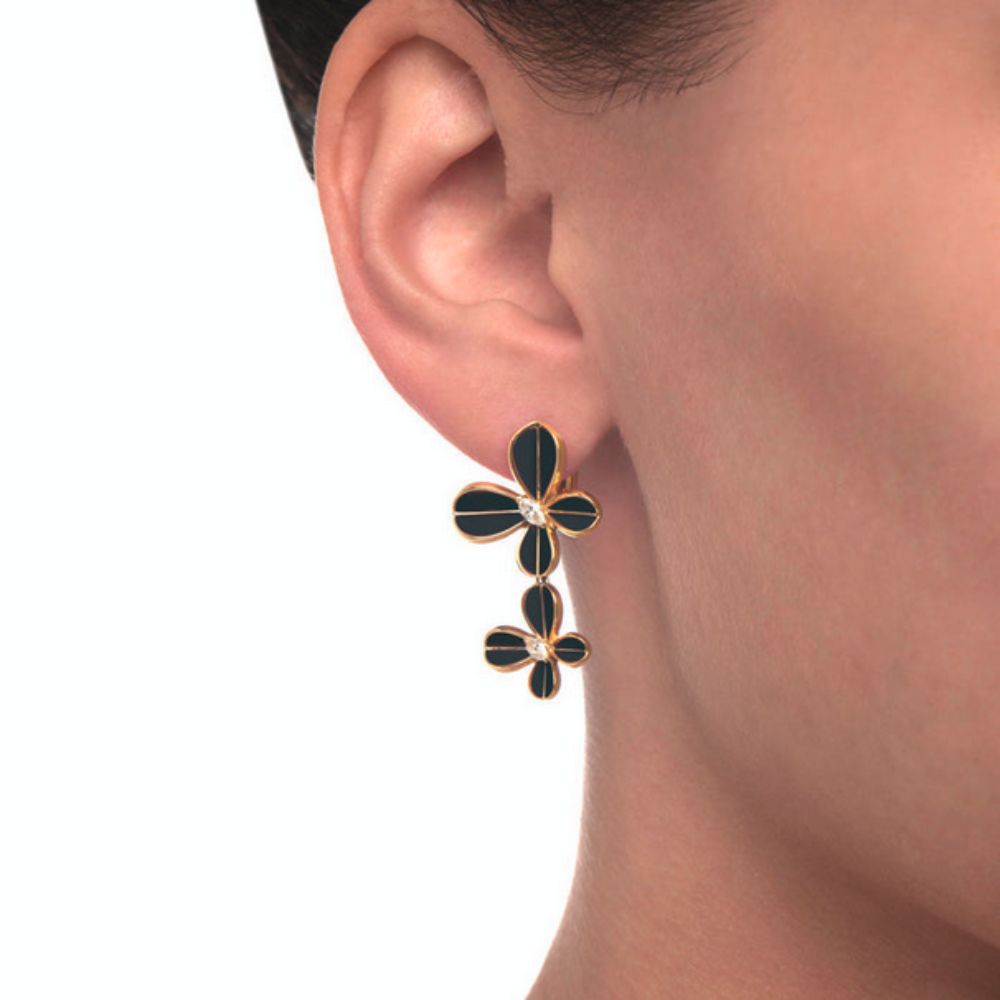 Close up of Samra Marquise Butterfly Yellow Gold Dangling Earring worn by a model