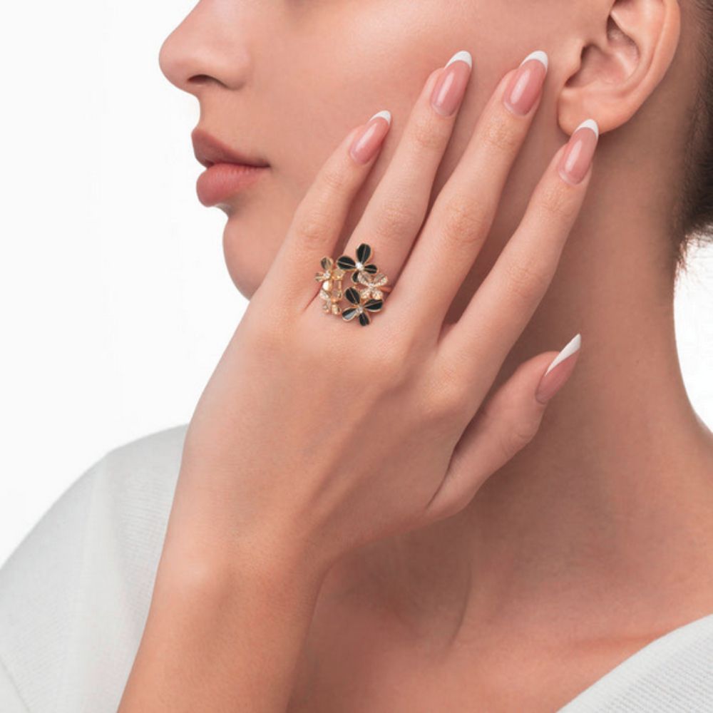 A model displaying Samra Marquise Butterfly Yellow Gold Multi Ring on her finger