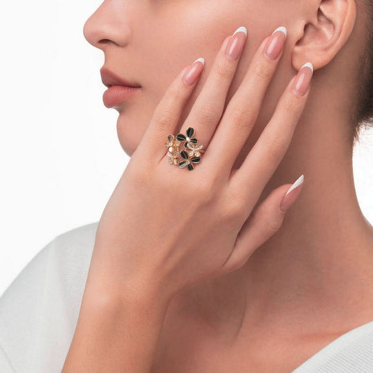 A model displaying Samra Marquise Butterfly Yellow Gold Multi Ring on her finger
