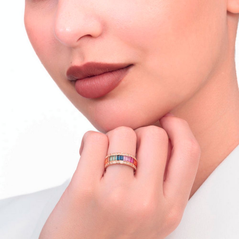A model showing Samra Noor Rose Gold Baguette Sapphire Half Set Band on her finger