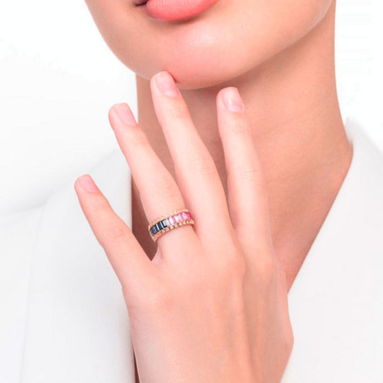 A model showing Samra Noor Rose Gold Baguette Sapphire Ring on her finger