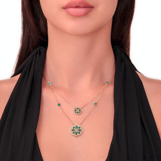 A model waering Samra Ward Turath Double Necklace